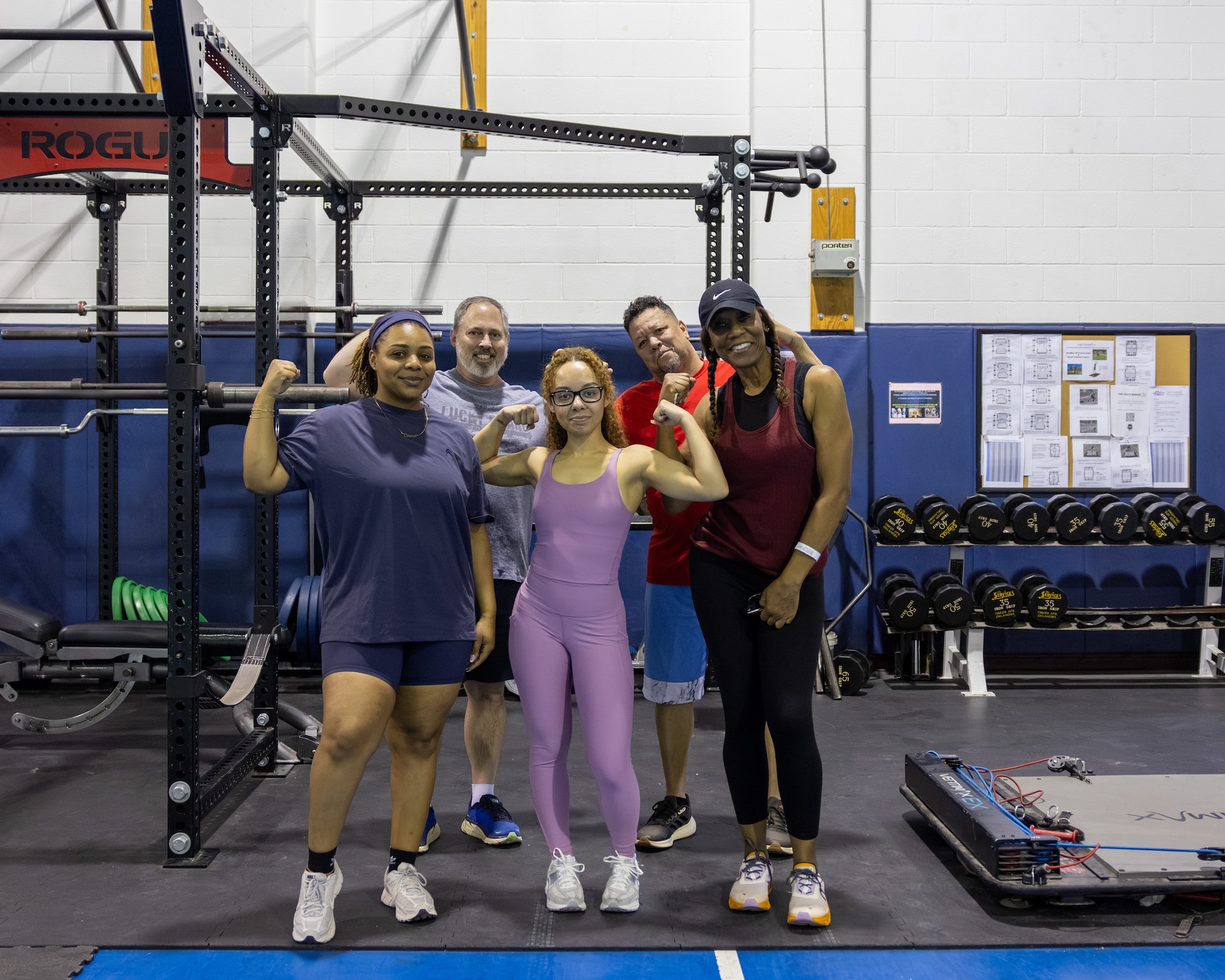 Group of people pose for picture.