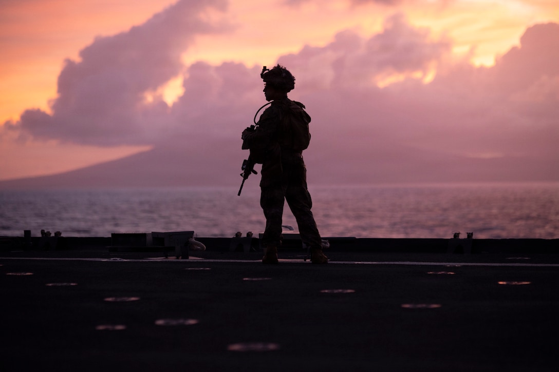 SURIGAO STRAIT (Feb. 17, 2026) – U.S. Marine Corps Lance Cpl. Christopher Perez-Reyes, an amphibious combat vehicle crewman assigned to Task Force Ashland, I Marine Expeditionary Force, provides security while scouting for surface contacts as part of the small craft action team during defense of the amphibious task force aboard amphibious dock landing ship USS Ashland (LSD 48) while transiting through the Surigao Strait Feb. 17, 2026. TF Ashland is a flexible, forward-deployed crisis response force led by the 15th Marine Expeditionary Unit. Purpose-built to integrate with allies and partners, TF Ashland supports a free and open Indo-Pacific by providing immediate response capabilities for any contingency. (U.S. Marine Corps photo by Gunnery Sgt. Manuel Serrano)