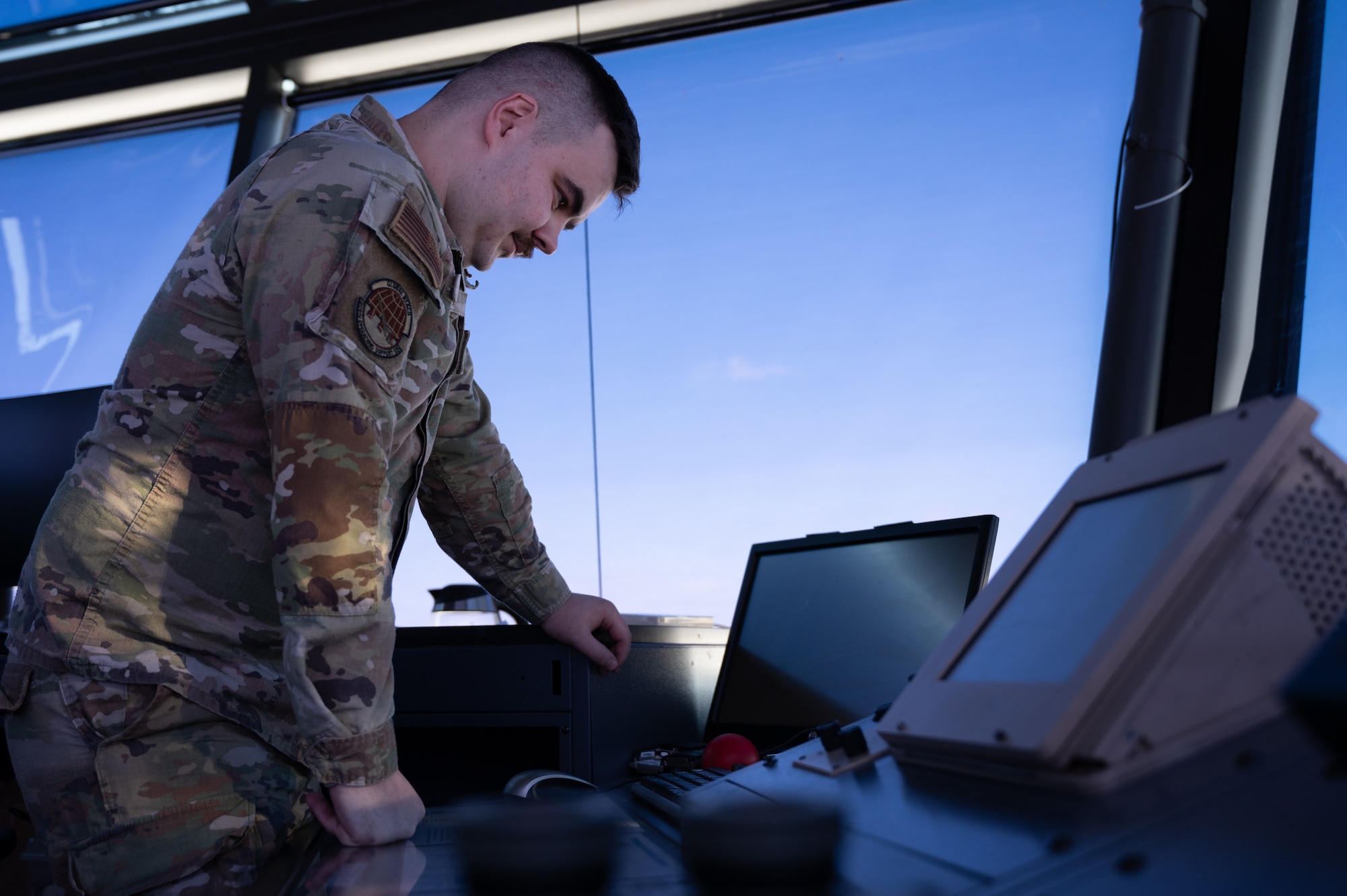U.S. Air Force Staff Sgt. Zachariah Field, 305th Operations Support Squadron air traffic watch supervisor, reviews automated terminal information systems for weather updates on Joint Base McGuire-Dix-Lakehurst, N.J., Feb. 24, 2026. Even as Winter Storm Hernando impacted the area, teams maintained operational readiness across flight lines, roadways and support facilities. (U.S. Air Force photo by Airman 1st Class Matthew Almazan)