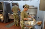 During the Patient Tray Services block of instruction in the Medical Education and Training Campus Nutrition & Diet Therapy course, trainees apply classroom knowledge in a hands-on kitchen laboratory environment that mirrors real-world clinical food service operations. This training reinforces the critical role Army and Air Force nutrition care specialists play in patient care and recovery within fixed medical facilities.