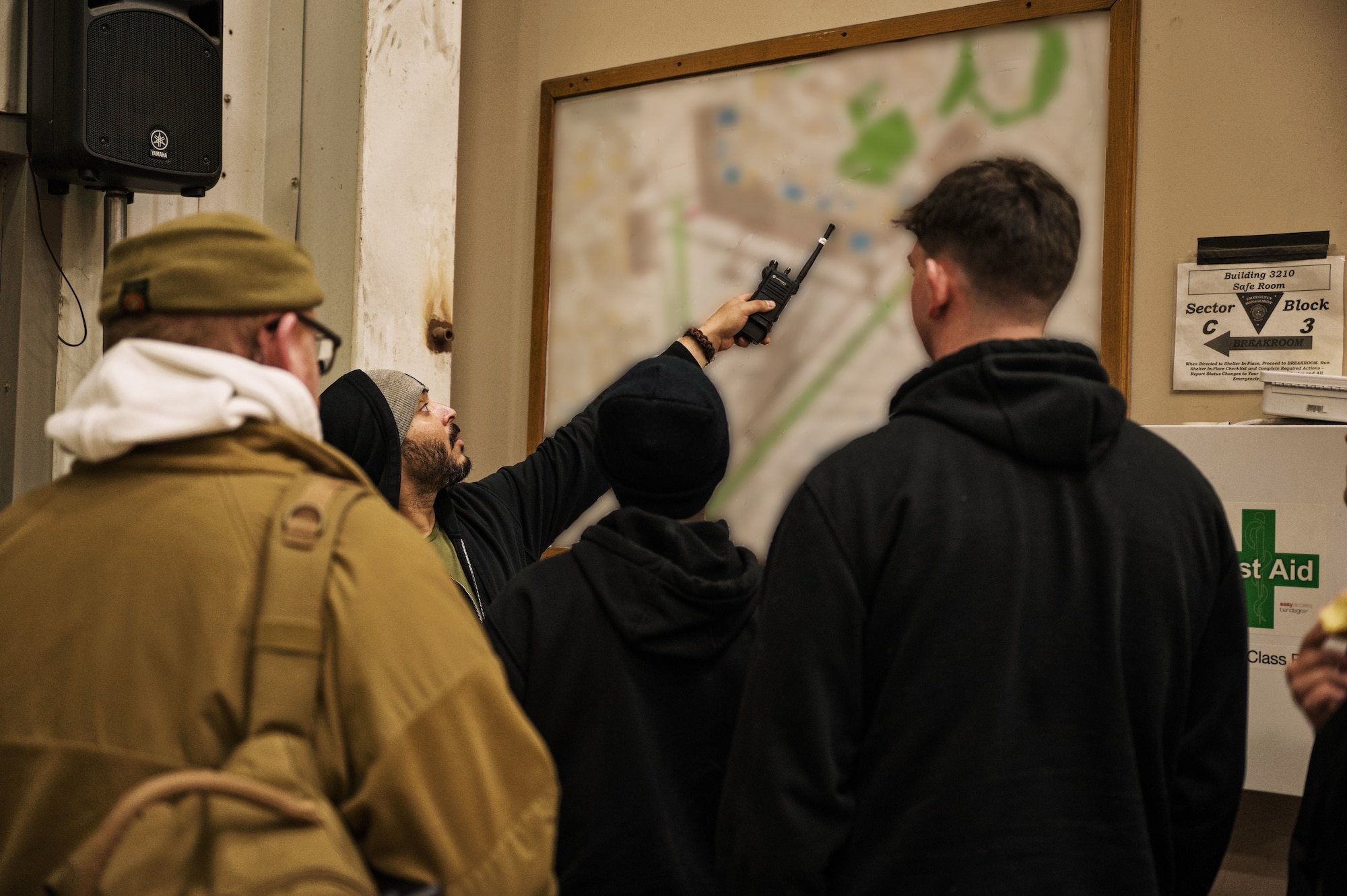 Jan Vazquez, 87th Civil Engineer Squadron Airfield Operations team lead, gives a safety and operations brief before teams began snow-clearing operations on Joint Base McGuire-Dix-Lakehurst, N.J., Feb. 22, 2026. Even in times of inclement weather, mission essential personnel maintain operational readiness of the base. (U.S. Air Force photo by 2nd Lt. Gabriel Davenport)