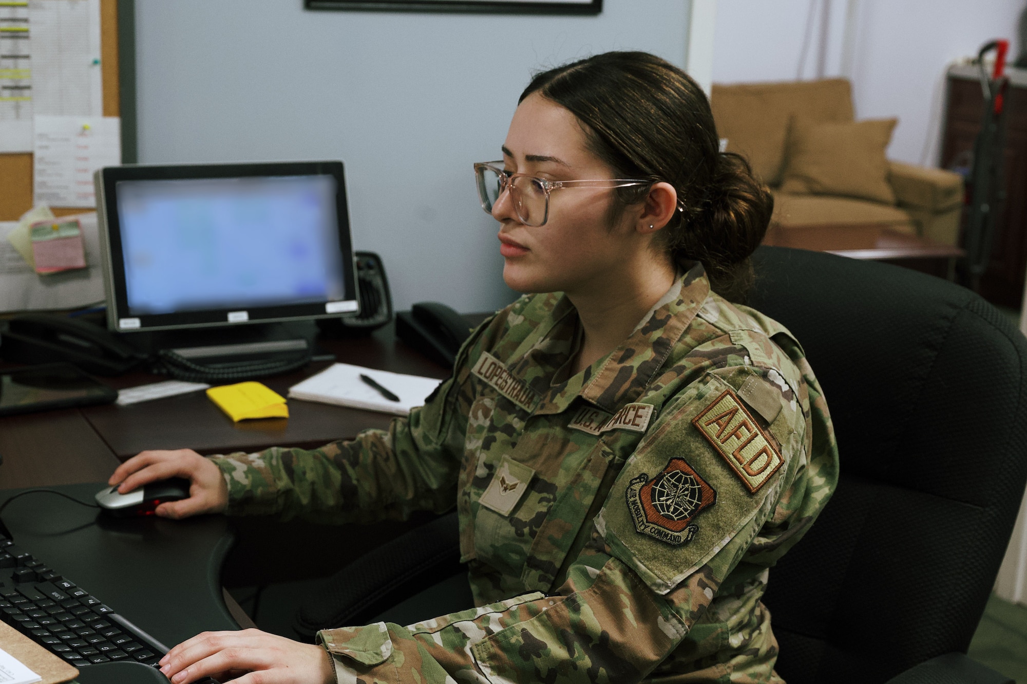 Airman 1st Class Valerie Lopez-Estrada, 305th Operations Support Squadron airfield management shift lead, sends out vital information from the Base Operations Center to update personnel about weather conditions at Joint Base McGuire-Dix-Lakehurst, N.J., Feb 22, 2026. As Winter Storm Hernando moved throughout the region, personnel across the installation maintained mission readiness and essential base operations. (U.S. Air Force photo by 2nd Lt. Gabriel Davenport)