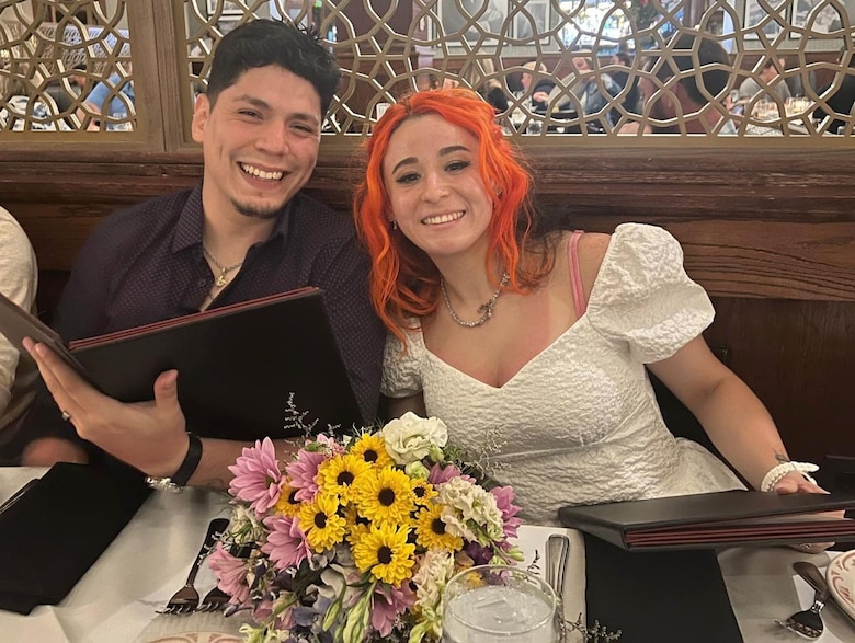 Picture of a man and lady sitting at lunch.