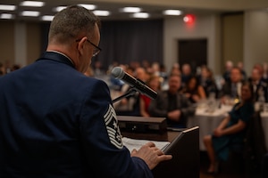 Chief Unterseher stands at a podium, delivering a speech to the people at the annual awards ceremony