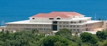 A view of the new U.S. Naval Hospital Guam. A ribbon-cutting ceremony was held to unveil the facility, which boasts 281,000 square feet, including 42 beds, two cesarean section rooms, improved diagnostic and ancillary capabilities such as MRI and CT scanning suites, and replaces the old facility built in 1954. (U.S. Navy photo by Jesse Leon Guerrero/Released)