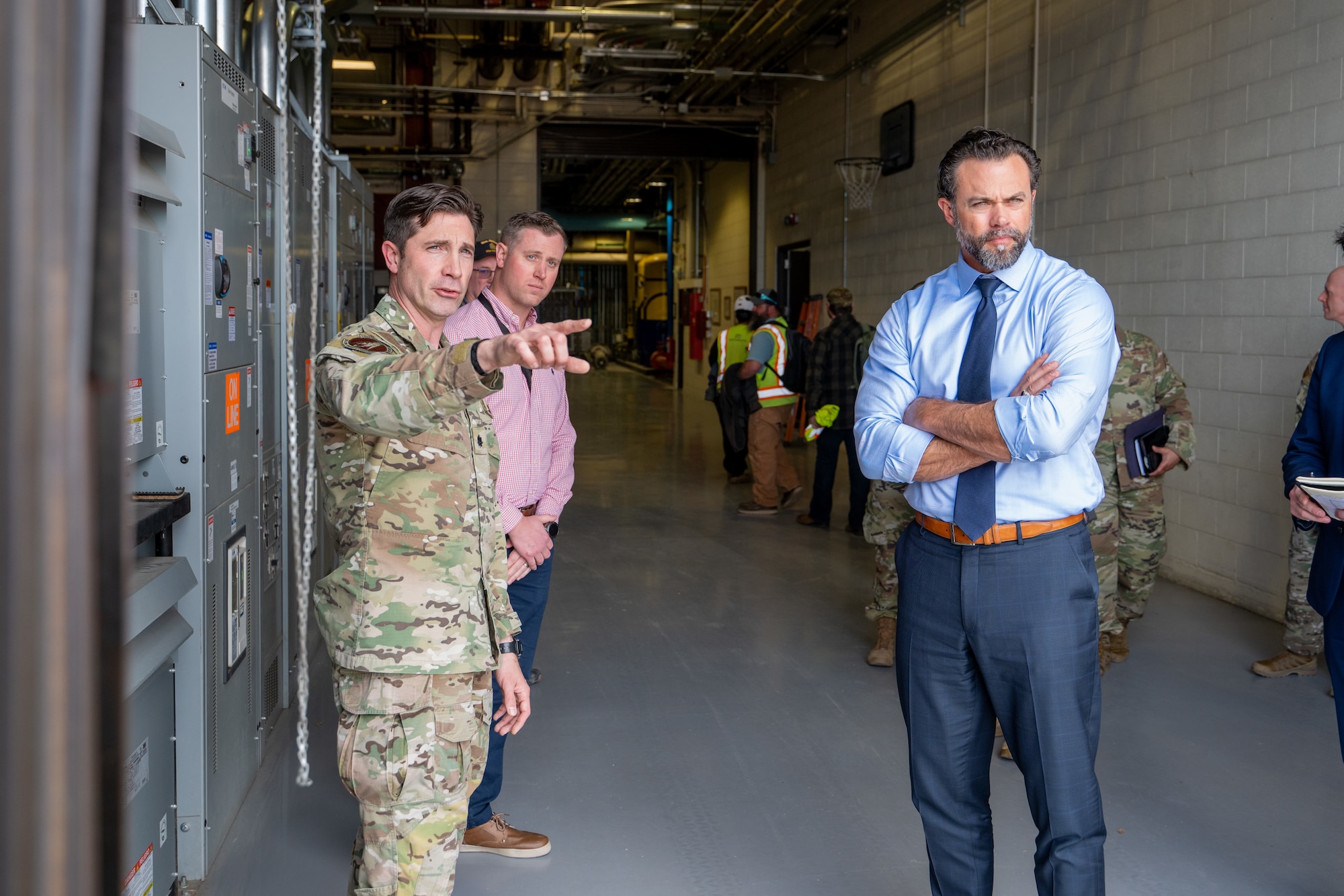 U.S. Air Force Lt. Col. Brandon Goebel, 50th Civil Engineer Squadron commander, left, briefs the Honorable Matt Lohmeier, Under Secretary of the Air Force, during a tour at Schriever Space Force Base, Colorado, Feb. 24, 2026.