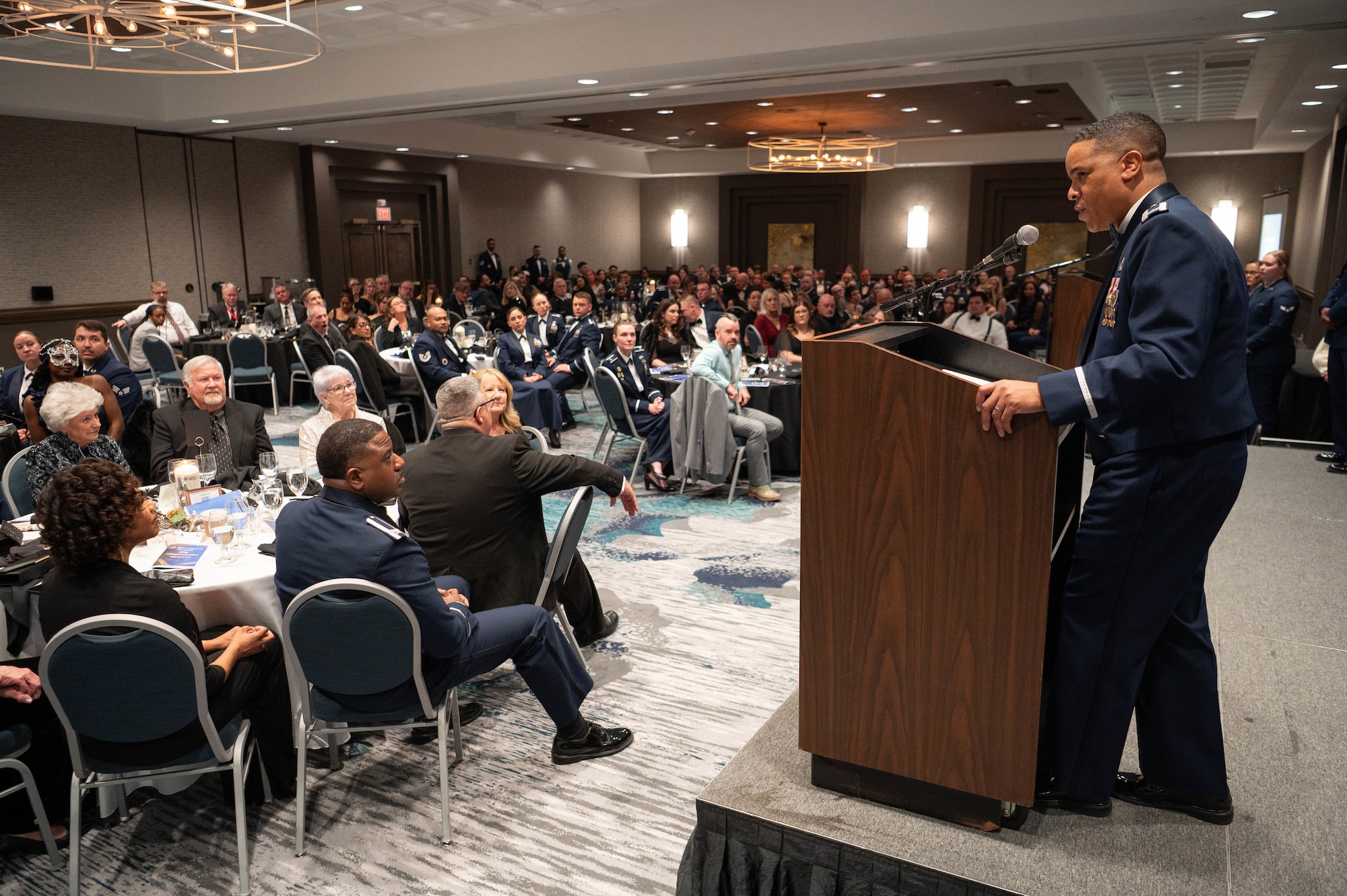 Man speaking on podium