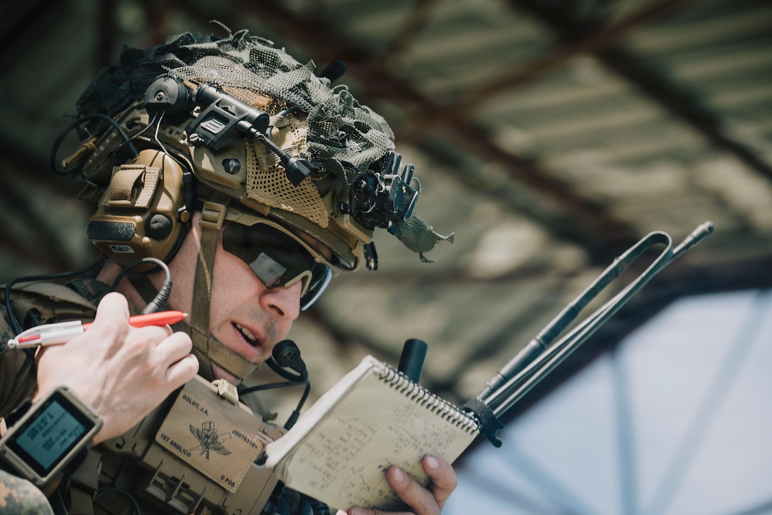 U.S. Marine Corps Capt. Justin Goldt, a team lead assigned to 1st Air Naval Gunfire Liaison Company, I Marine Expeditionary Force Information Group, relays a call for fire to a U.S. Air Force B-52 Stratofortress bomber during a bomber live drop exercise with Marines assigned to Marine Rotational Force Southeast Asia, I Marine Expeditionary Force, and Philippine airmen assigned to the 710th Special Operations Wing during a bomber live drop exercise at Crow Valley Gunnery Range, Philippines, Feb. 2, 2026. MRF-SEA is a flexible task force that varies in size, capability, and composition, to accomplish different types of missions as a purpose-built unit, maintaining a forward presence and enhancing Marine Corps crisis and contingency response capabilities. MRF-SEA is uniquely organized to support security cooperation and advance mutual security objectives shared with Southeast Asian Allies and partners. (U.S. Marine Corps photo by Sgt. Luis Agostini)