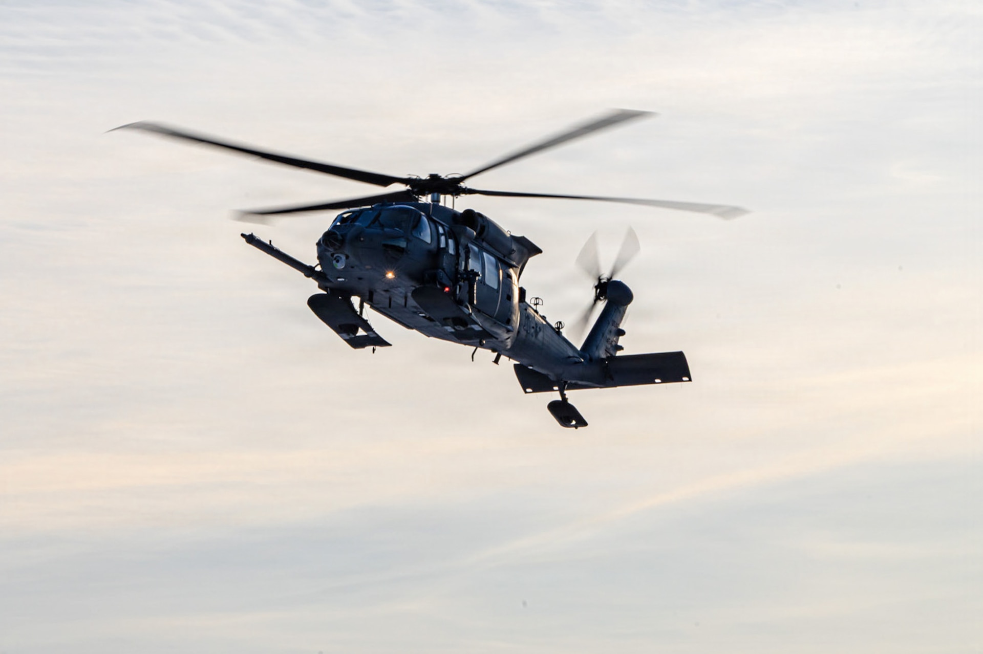 An Alaska Air National Guard HH-60W Jolly Green II helicopter, assigned to the 210th Rescue Squadron, 176th Wing, returns to Joint Base Elmendorf-Richardson, Alaska, after conducting a rescue mission for an injured snowmachiner, Feb. 21, 2026. The mission marked the time the AKANG used the HH-60W for a rescue.