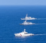 From front to back, Philippine Coast Guard Gabriela Silang-class offshore patrol vessel BRP Gabriela Silang (OPV 8301), Philippine Navy Jose Rizal-class guided-missile frigate BRP Antonio Luna (FFG 151), and U.S. Navy Arleigh Burke-class guided-missile destroyer USS Dewey (DDG 105) steam in formation in the Philippine Sea, during the multilateral Maritime Cooperative Activity (MCA) alongside Japan and the Philippines in the Philippines’ Exclusive Economic Zone, Feb. 25, 2026.