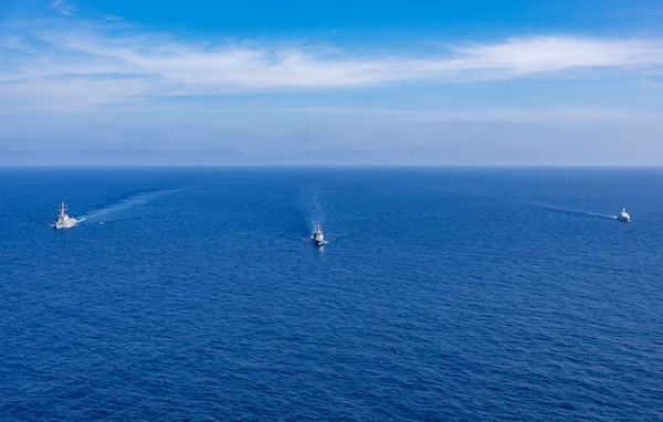 From left to right, U.S. Navy Arleigh Burke-class guided-missile destroyer USS Dewey (DDG 105), Philippine Navy Jose Rizal-class guided-missile frigate BRP Antonio Luna (FFG 151) and Philippine Coast Guard Gabriela Silang-class offshore patrol vessel BRP Gabriela Silang (OPV 8301) steam in formation in the Philippine Sea, during the multilateral Maritime Cooperative Activity (MCA) alongside Japan and the Philippines in the Philippines’ Exclusive Economic Zone, Feb. 25, 2026.
