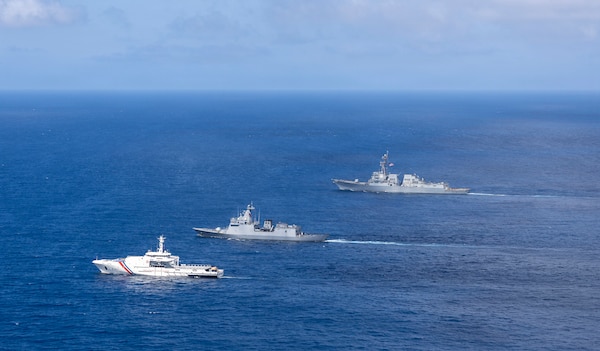 From left to right, Philippine Coast Guard Gabriela Silang-class offshore patrol vessel BRP Gabriela Silang (OPV 8301), Philippine Navy Jose Rizal-class guided-missile frigate BRP Antonio Luna (FFG 151), and U.S. Navy Arleigh Burke-class guided-missile destroyer USS Dewey (DDG 105) steam in formation in the Philippine Sea, during the multilateral Maritime Cooperative Activity (MCA) alongside Japan and the Philippines in the Philippines’ Exclusive Economic Zone, Feb. 25, 2026.