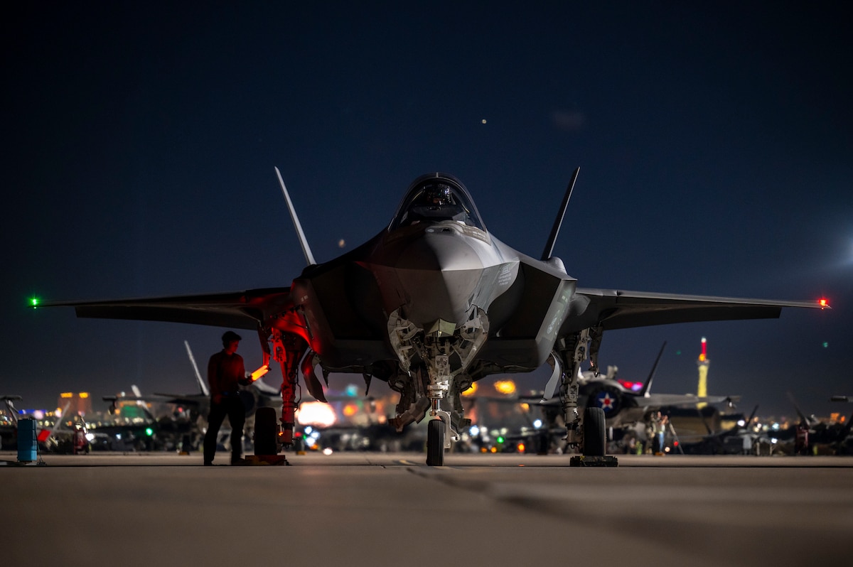 Airmen assigned to the 95th Fighter Generation Squadron perform preflight checks on an F-35A Lightning II during an exercise Red Flag-Nellis 26-1 night sortie at Nellis Air Force Base, Nev., Feb. 9, 2026. Hundreds of Airmen from the 325th Fighter Wing travelled to Nellis AFB in support of the training exercise working alongside joint and coalition partners to enhance warfighting skills. (U.S. Air Force photo by Tech. Sgt. Betty R. Chevalier)