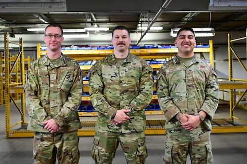 U.S. Air Force Airmen assigned to the 19th Aircraft Maintenance Squadron and 19th Logistics Readiness Squadron pose for a photo during a Maintenance-Supply Immersion Program event at Little Rock Air Force Base, Arkansas, Feb. 17, 2026. The Airmen helped create the Maintenance-Supply Immersion Program, which brings maintenance and materiel management personnel together to strengthen teamwork and improve communication in support of the installation’s C-130 mission.