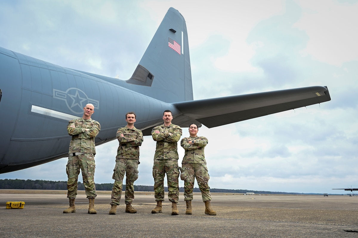 U.S. Air Force Airmen assigned to the 19th Aircraft Maintenance Squadron and 19th Logistics Readiness Squadron pose in front of a C-130J Super Hercules aircraft during a Maintenance-Supply Immersion Program training event at Little Rock Air Force Base, Arkansas, Feb. 17, 2026. The Airmen participated in the Maintenance-Supply Immersion Program, an initiative designed to strengthen collaboration between maintenance and materiel management teams in support of the base’s airlift mission.