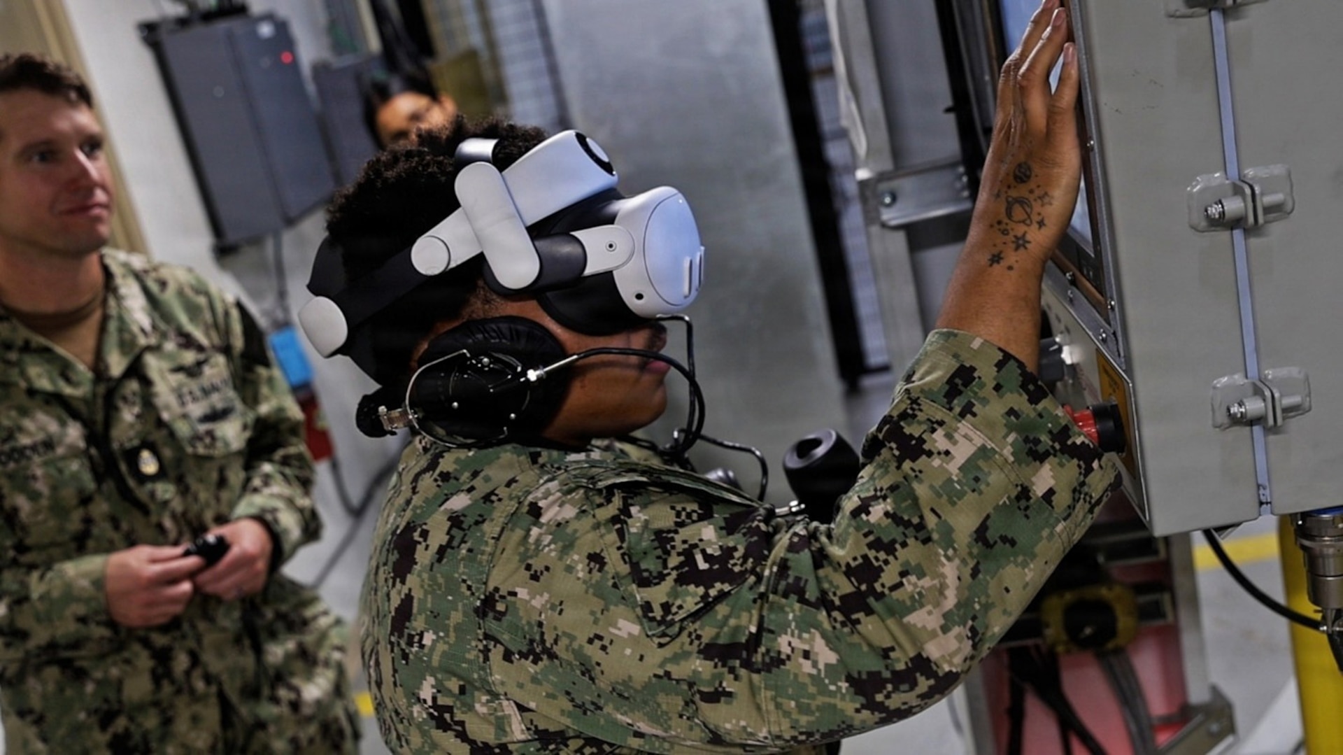 Augmented reality was used to place new and experienced Sailors in various scenarios that mimic battle conditions to identify issues for improving the elevator system and developing better training. (U.S. Navy Photo by Jay Butterbaugh, CTR)