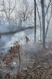 Wildland firefighters assigned to the Oklahoma Army National Guard conduct firefighting operations near Talihina, Oklahoma, Feb. 26, 2026.