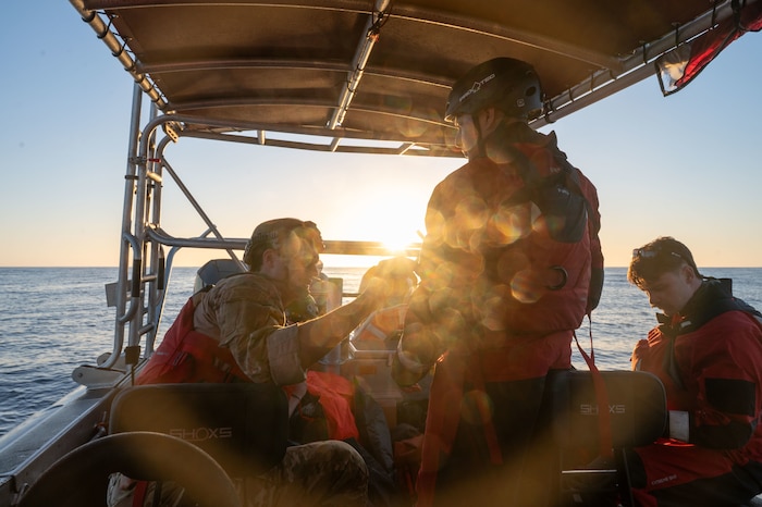 U.S. Air Force Airmen prepare their gear during Exercise Bamboo Eagle 26-1 off the coast of San Diego, California, Feb. 13, 2026. Airmen and Guardians are challenged to execute complex missions, ensuring their readiness to respond decisively to emerging threats and global challenges. (U.S. Air Force photo by Airman 1st Class Jaden Kidd)