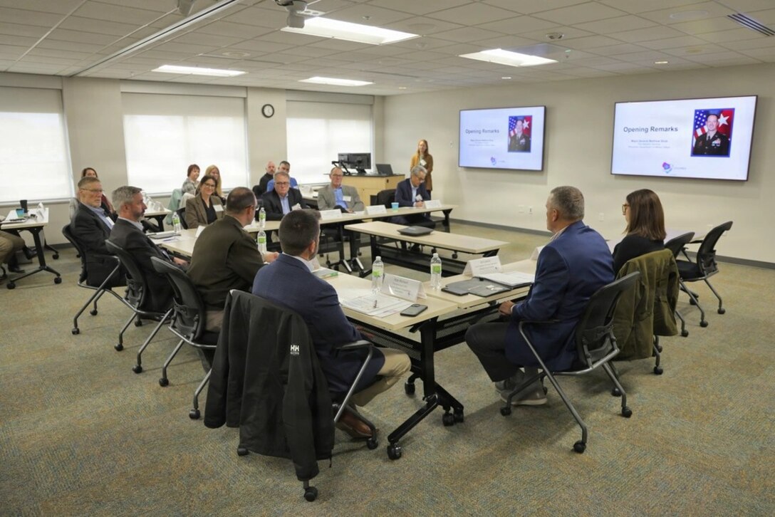 A group sitting around a table discussing plans