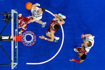 Basketball players on court