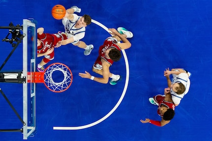 Basketball players on court