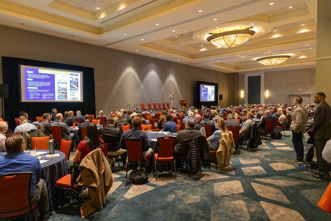NORTH BETHESDA, Maryland (Feb. 25, 2026) – Capt. Chris Matassa, commanding officer of Naval Surface Warfare Center, Carderock Division, delivers opening remarks highlighting the significance of local collaboration during Carderock's Industry Day. The event was co-hosted by Carderock and the Pike District Partnership with support from the Montgomery County Economic Development Corporation. Carderock, the Navy's innovation and ship design powerhouse, headquartered in West Bethesda, Maryland, is a world-class research and development facility specializing in critical ship and ship systems design. (U.S. Navy photo by Aaron Thomas)