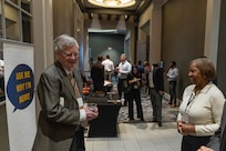 NORTH BETHESDA, Maryland (Feb. 25, 2026) – Odean Cameron, from Naval Surface Warfare Center, Carderock Division, switches places with an industry attendee to better understand their perspective during a collaborative session at Carderock's Industry Day. The exercise was designed to show how Carderock can help solve problems and foster collaboration between the Navy and industry partners. The event was co-hosted by Carderock and the Pike District Partnership with support from the Montgomery County Economic Development Corporation. Carderock, the Navy's innovation and ship design powerhouse, headquartered in West Bethesda, Maryland, is a world-class research and development facility specializing in critical ship and ship systems design. (U.S. Navy photo by Aaron Thomas)