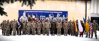 Allies and partners gather for a group photo after the Brave Band 2026 Exercise. The Lithuanian, Polish, Ukrainian Brigade (LITPOLUKRBRIG) conducted Exercise Brave Band 2026 from Jan. 25 to Feb. 6, an annual battle staff training event designed to enhance the brigade headquarters’ ability to plan, synchronize, and execute multinational operations in a complex operational environment.