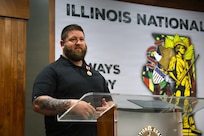 Staff Sgt. Christopher P. Kelnhofer delivers remarks during his retirement ceremony at the Illinois Military Academy in Springfield, Illinois, Feb. 22, 2026.