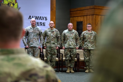 Senior leaders stand alongside Lt. Col. Lionel Gonzalez during his retirement ceremony at Illinois National Guard headquarters in Springfield, Illinois, Feb. 22.
