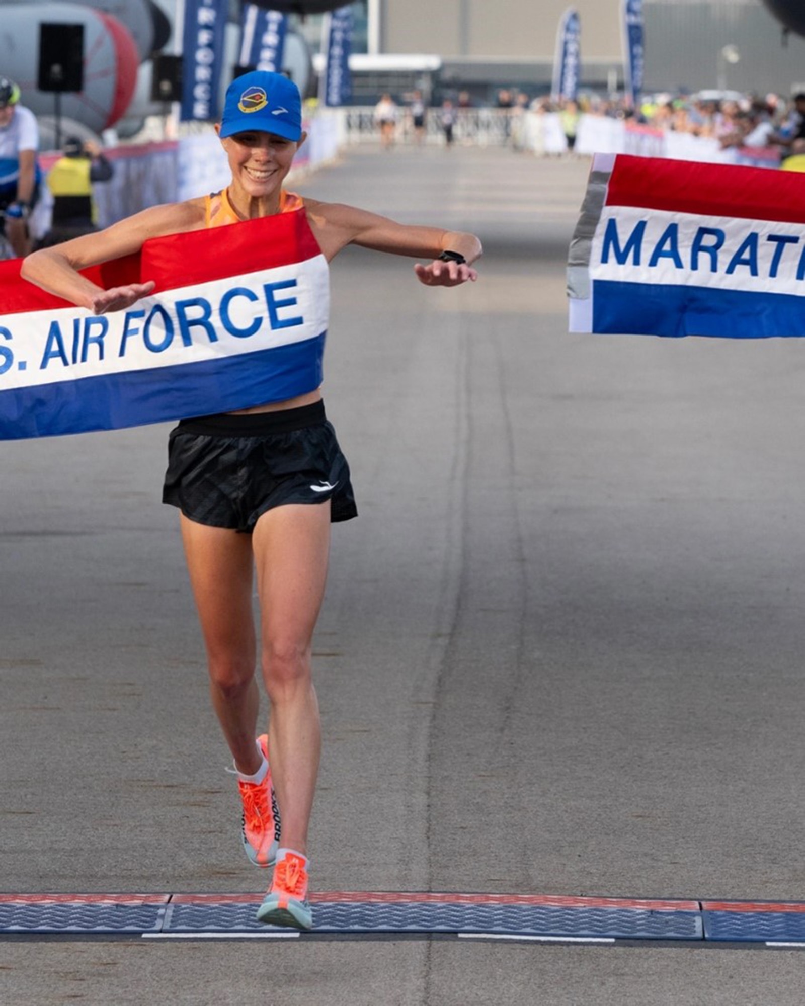 Capt. Jaci Smith, an Aircraft Analysis Squadron analyst, crosses the finish line first during the U.S. Air Force Marathon at Wright-Patterson Air Force Base, Ohio. This experience as a competitor is foundational to her selection to represent the U.S. Armed Forces on a global stage at the World Military Cross Country Championship in Greece from Feb. 25 – Mar. 2, 2026. (Courtesy photo provided by Capt. Jaci Smith)
