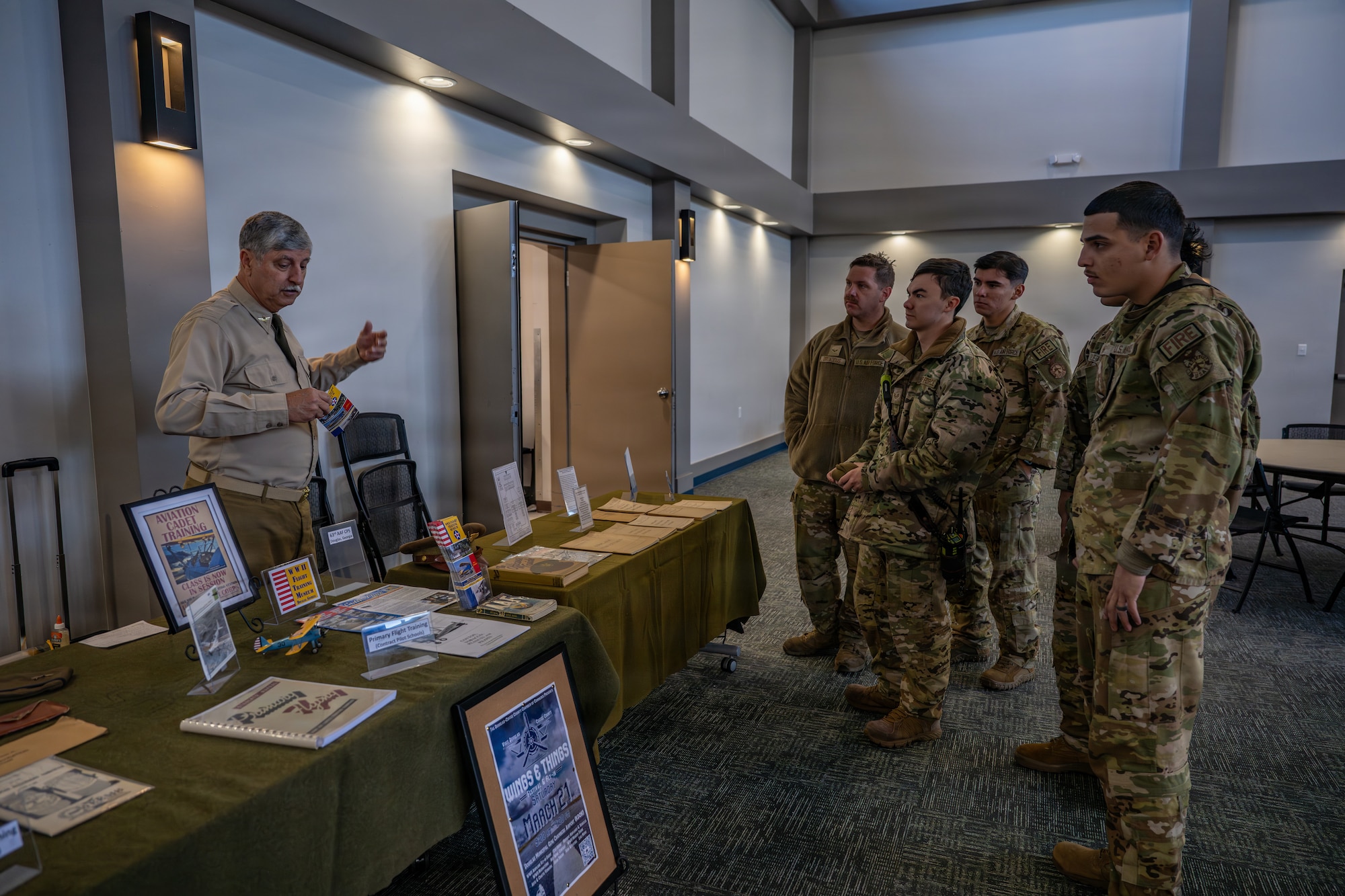 Retired U.S. Air Force Lt. Col. Timothy Oliver, a World War II Flight Training Museum docent, speaks with local Junior ROTC students about the Civil Air Patrol program during Saluting Our Aviation Roots (SOAR) Week at Moody Air Force Base, Georgia, Feb. 24, 2026. He shared insights on the program’s history and its continued impact on developing future aviation leaders. (U.S. Air Force photo by Senior Airman Savannah Carpenter)
