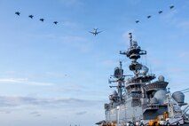U.S. Air Force, Navy, and Marine Corps Aircraft Flyover USS Tripoli [Image 1 of 3]