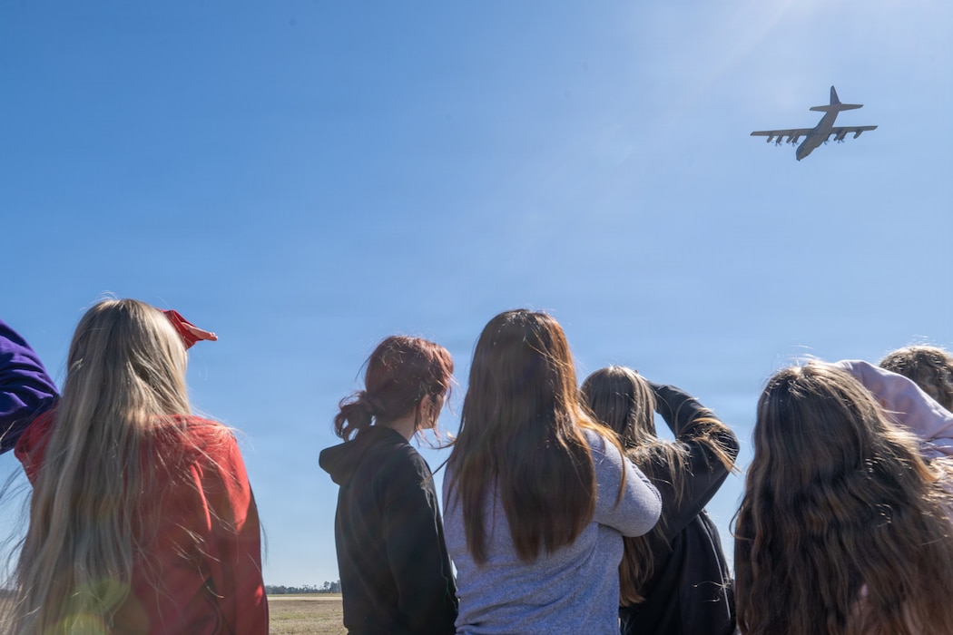 Students watch an aerial demonstration during Saluting Our Aviation Roots (SOAR) week at Moody Air Force Base, Georgia, Feb. 24, 2026. SOAR week is a five-day event highlighting the installation’s mission, heritage and the Airmen who execute it daily. (U.S. Air Force photo by Senior Airman Iain Stanley)