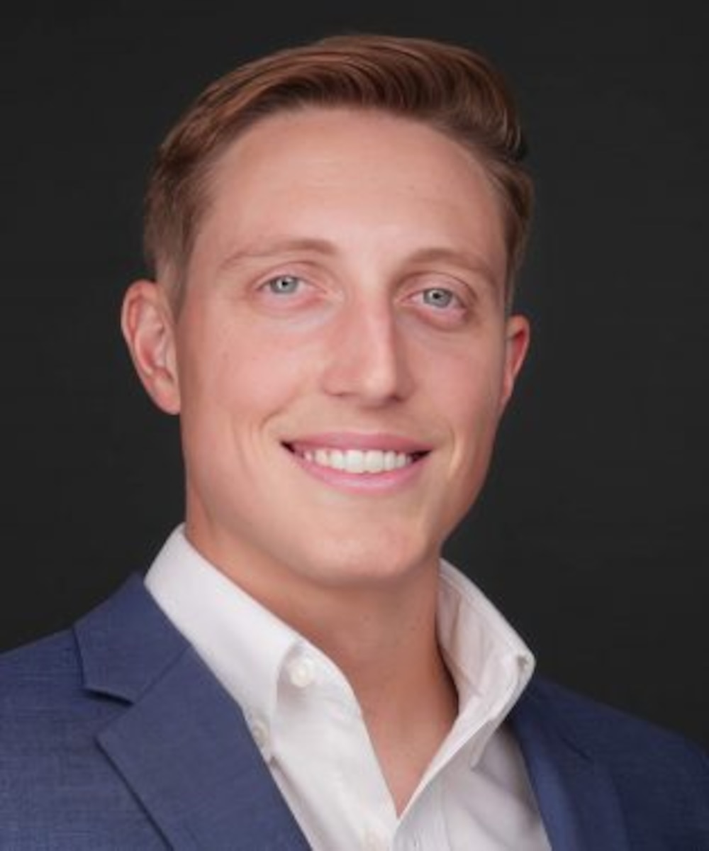 Candid photo of Air Force Capt Connor Elkin, IMA to the DAF Director of the AI Accelerator