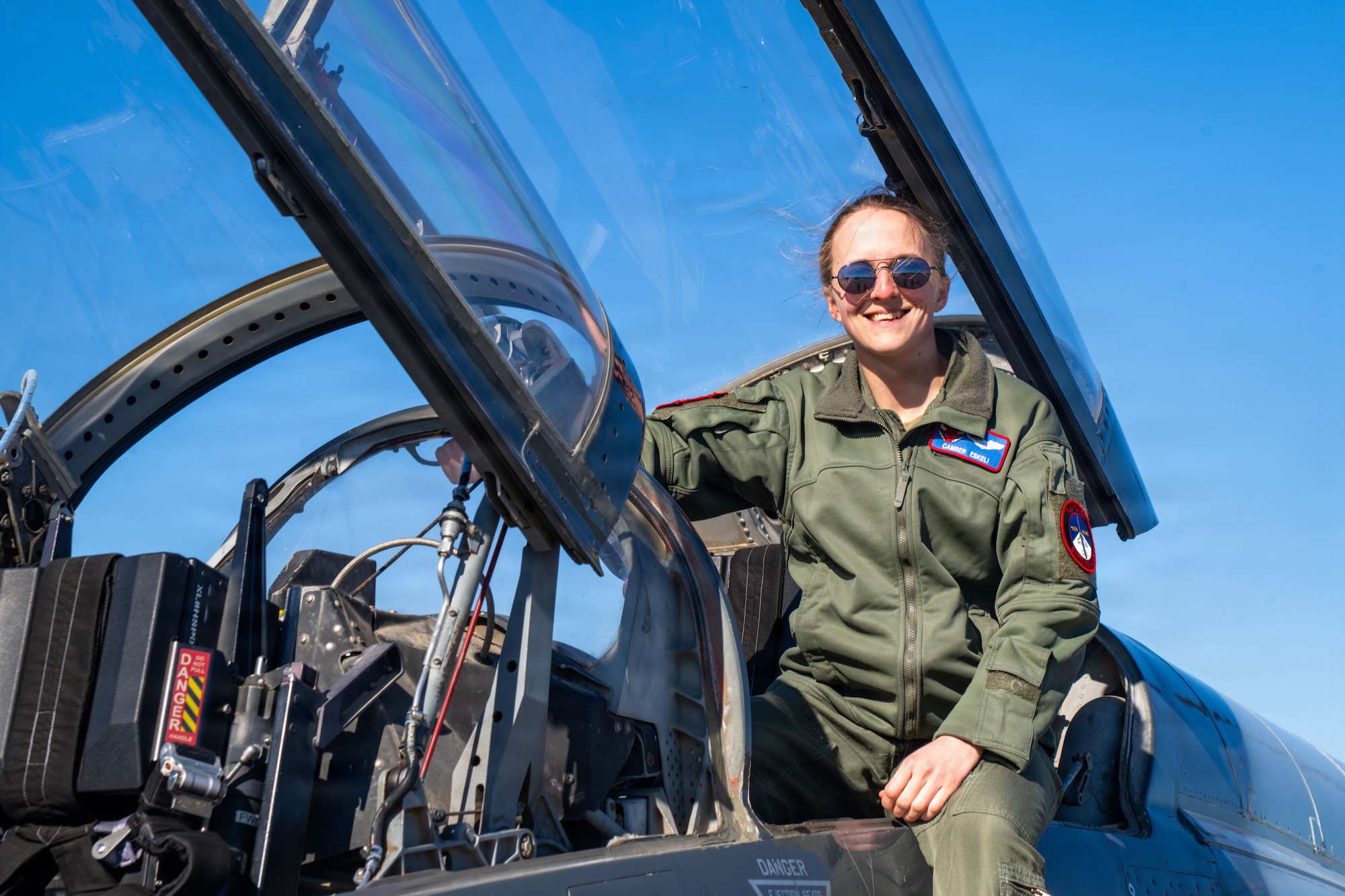 A U.S. Air Force T-38 Talon pilot assigned to the 87th Flying Training Squadron poses for a portrait during the Saluting Our Aviation Roots event at Moody Air Force Base, Georgia, Feb. 24, 2026. The static displays showcased aircraft and allowed attendees to learn more about their capabilities. (U.S. Air Force photo by Airman 1st Class Noah Noonan)
