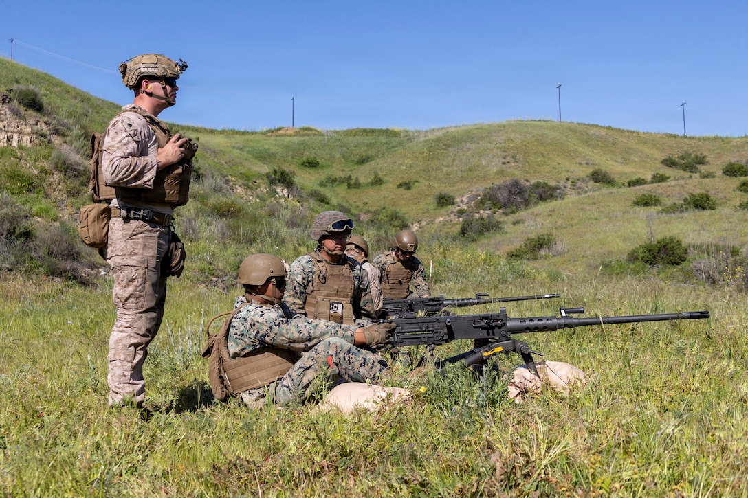 U.S. Marines with I Marine Expeditionary Force fire M2 .50 caliber machine guns during a basic machine gun course at Marine Corps Base Camp Pendleton, Feb. 13, 2026. Hosted by the Combat Skills Training School, the course provides Marines with practical applications to enhance proficiency with crew-served weapons. (U.S. Marine Corps photo by Sgt. Sean Potter)