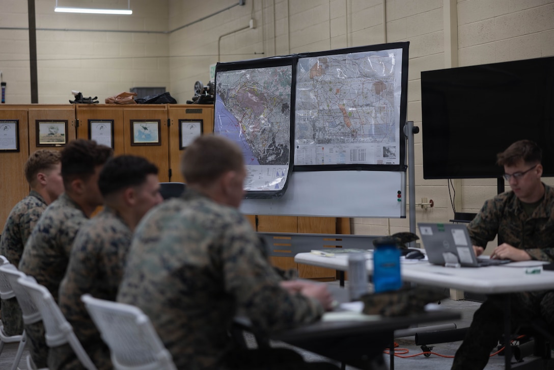 U.S. Marines with 1st Radio Battalion, I Marine Expeditionary Force Information Group, 2nd Radio Bn., II MIG, and 3rd Radio Bn., III MIG, participate in a frequency class during the Radio Reconnaissance Operators Course 26.2 at Marine Corps Base Camp Pendleton, California, Feb.17, 2026. The RROC is an annual course that trains and evaluates radio reconnaissance Marines and service members from the United Kingdom, Canada and Australia in developing advanced skills in signals intelligence, electronic warfare and reconnaissance skills over the course of several weeks. Participation in this course by allies underscores the importance of multilateral training opportunities to strengthen combined readiness and interoperability. (U.S. Marine Corps photo by Lance Cpl. Fabian Ortiz)