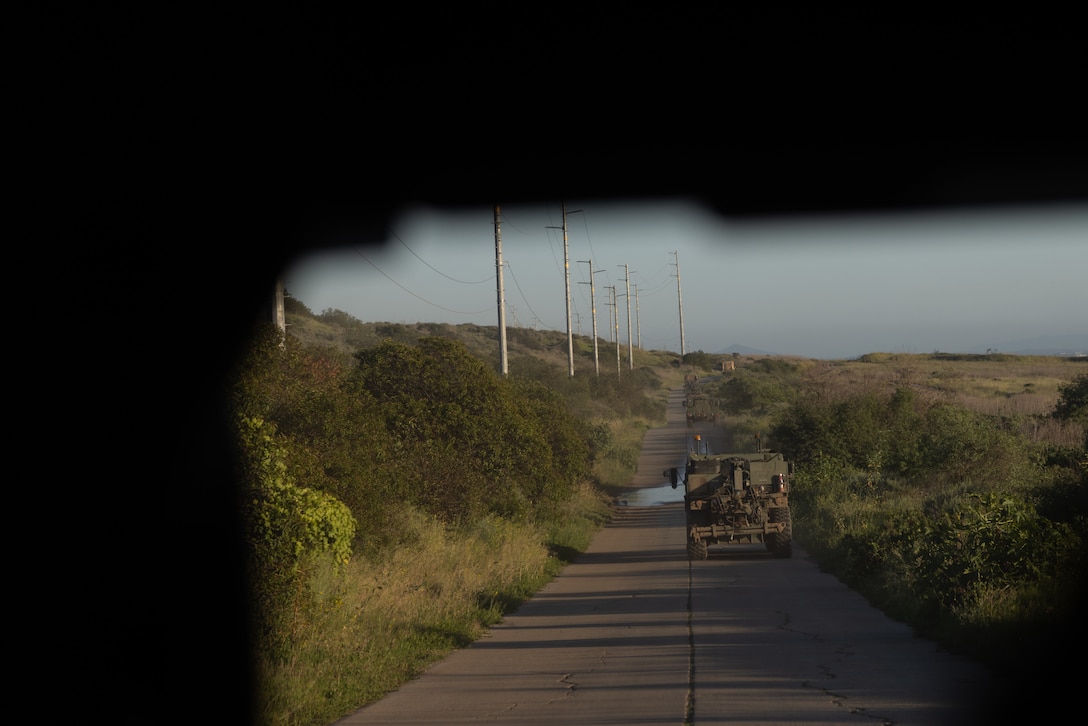 U.S. Marines with Marine Wing Support Squadron 371, Marine Air Control Group 38, 3rd Marine Aircraft Wing, conduct a convoy during a company field exercise at Marine Corps Base Camp Pendleton, California, Feb. 25, 2026. The exercise demonstrated the unit’s ability to sustain ground transportation operations for 3rd MAW in support of the Marine Air Ground Task Force. ​(U.S. Marine Corps photo by Lance Cpl. Samantha Devine)