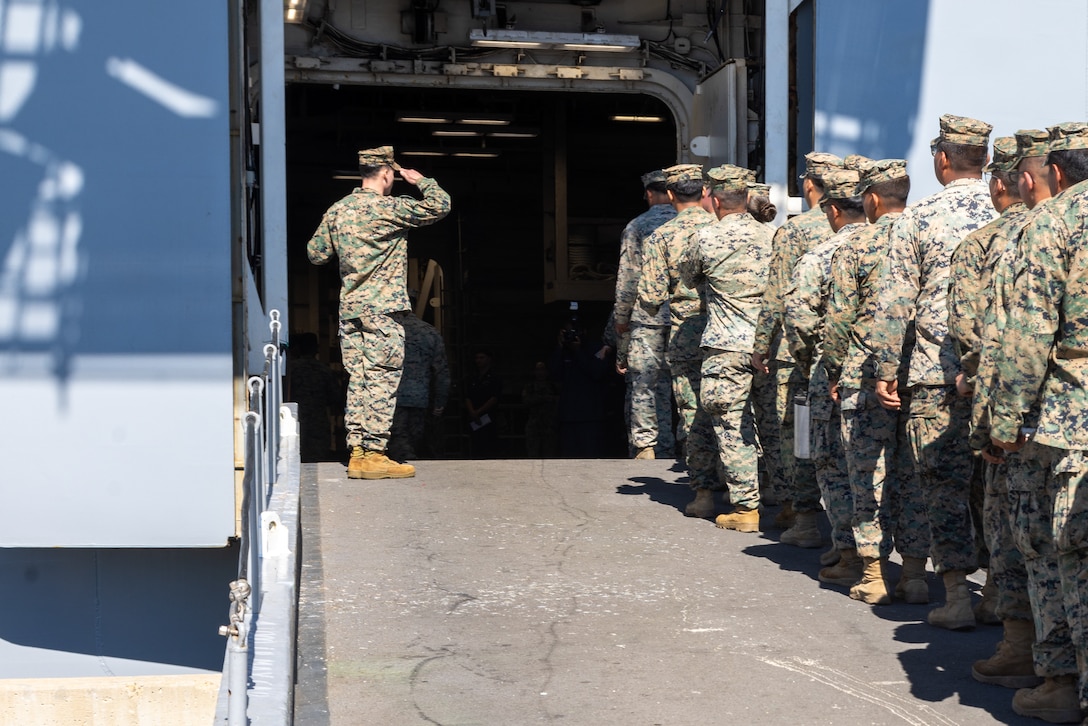 U.S. Marines with Marine Wing Support Squadron 371, Marine Air Control Group 38, 3rd Marine Aircraft Wing, board the Wasp-class amphibious assault ship USS Essex (LHD 2) at Naval Base San Diego, California, Feb. 26, 2026. The visit was conducted to prepare Marines for ship life and increase naval integration. (U.S. Marine Corps photo by Lance Cpl. Samantha Devine)