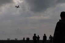 Simulated evacuees move toward a military aircraft for transport during a noncombatant evacuation operation exercise at U-Tapao Airport, Thailand, Feb. 26, 2026