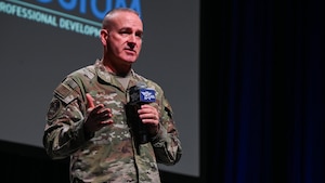 Chief Master Sgt. of the Air Force David Wolfe speaks at the Air Force Association Warfare Symposium Feb. 25, 2026. Wolfe spoke about competence, commitment and attitude. (U.S. Air Force photo by Tech. Sgt. Stuart Bright)