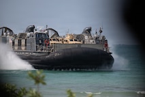 U.S. Navy landing craft, air cushion, attached to Assault Craft Unit 5, approaches Hat Yao Beach in an amphibious exercise to support exercise Cobra Gold 26, Rayong Province, Thailand, Feb. 26, 2026. Cobra Gold is the Indo-Pacific’s largest annual military exercise in mainland Asia, co-hosted by the U.S. and Thailand. The exercise brings together participants from multiple nations for military training and humanitarian projects that strengthen regional partnerships and demonstrate U.S. commitment to Indo-Pacific security.  (U.S. Air Force photo by Senior Airman Austin Salazar)