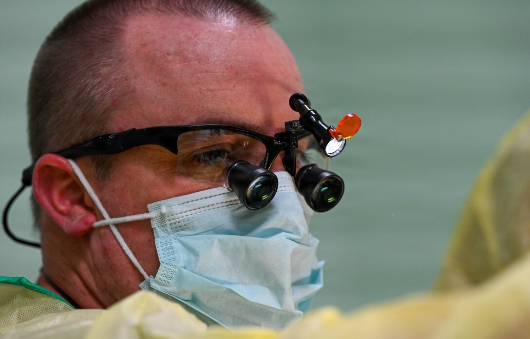 U.S. Air Force Reserve Maj. Andrew Hutchison, 419th Medical Squadron officer-in-charge of the Nevis dental team, performs a filling repair on a Nevisian patient at Charlestown Dental Clinic in Charlestown, Nevis, Feb. 24, 2026. This procedure was part of the Lesser Antilles Medical Assistance Team 2026 mission, which embeds U.S. Air Force and Reserve Airmen alongside host-nation providers to deliver care, exchange best practices and strengthen long-term medical partnerships. (U.S. Air Force Photo by Staff Sgt. Dakota Carter)