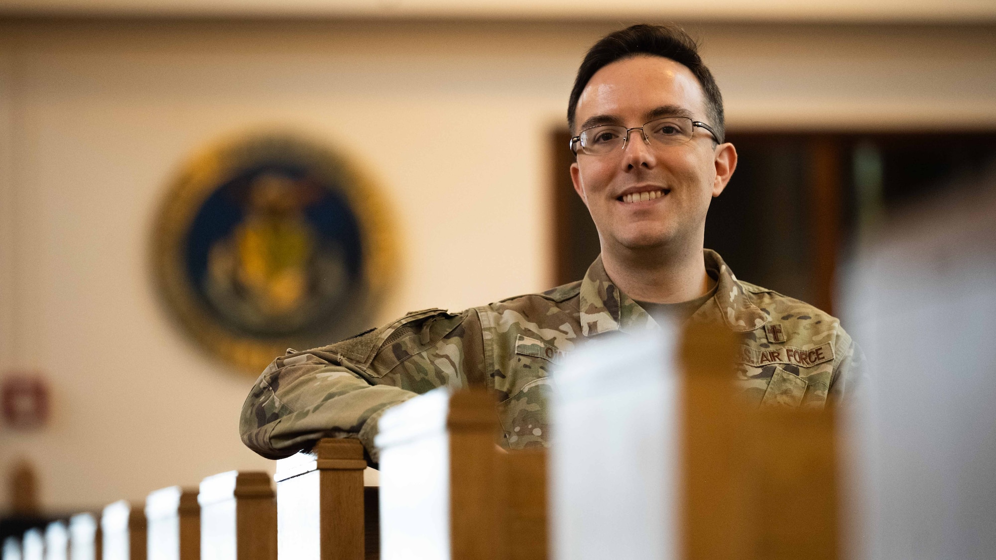 U.S. Air Force Capt. Philip O’Neill, 52nd Fighter Wing deputy wing chaplain, poses for a photo at the chapel Feb 27, 2026 on Spangdahlem Air Base, Germany. O’Neill along with his team won USAFEs Outstanding Large Chaplain Corps Team of the Year award by engaging in Airmen’s lives, making their presence felt in times of stress. (U.S. Air Force photo by Staff Sgt. Darius Frazier)