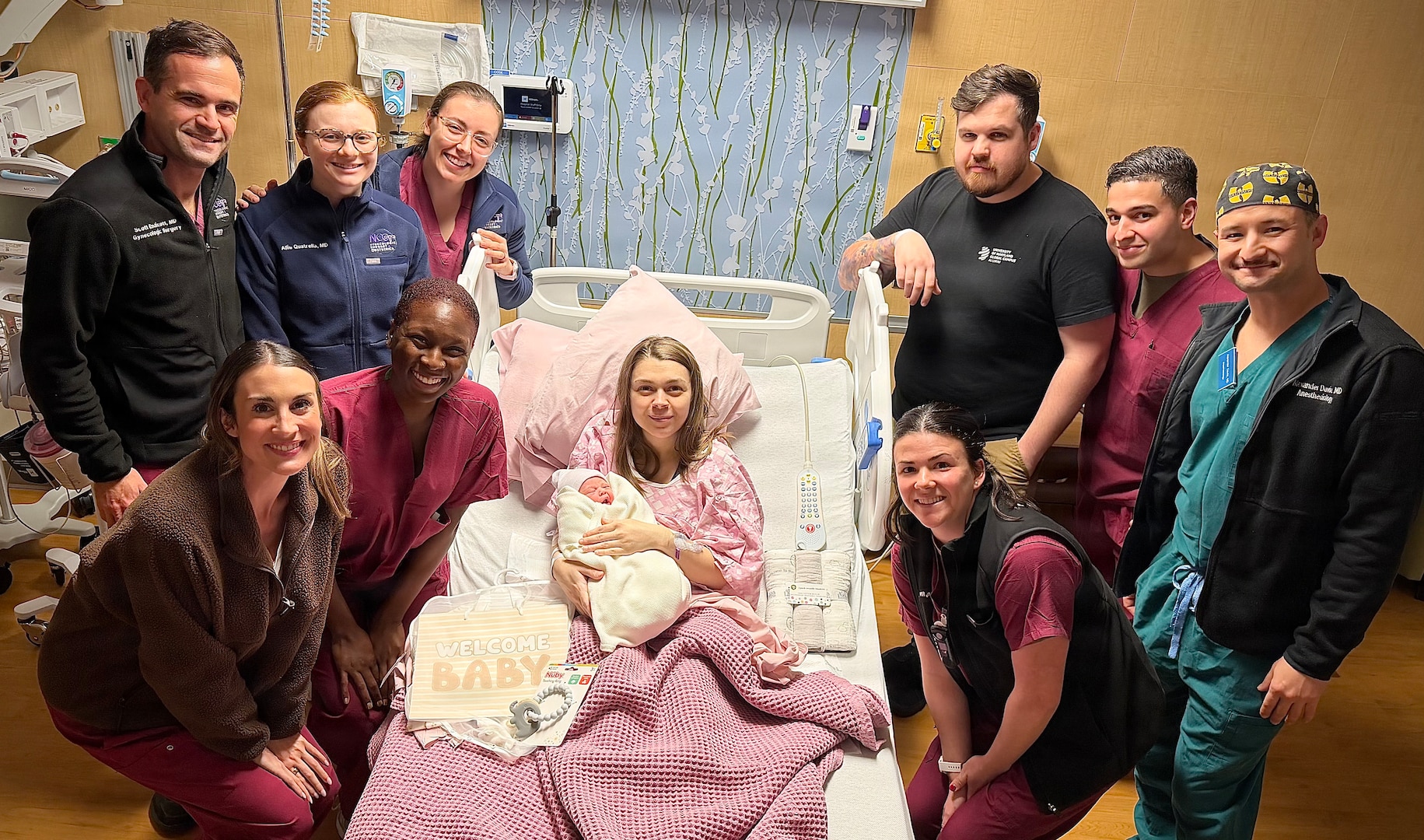 Staff of Walter Reed’s Mother Infant Care Center celebrates the birth of the first baby of 2026 born at Walter Reed, Brook Crone, with her proud parents retired U.S. Marines Andrea and Caleb Crone on New Year’s Day.