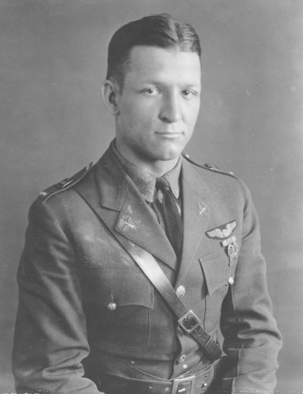 A man in uniform poses for a photo.