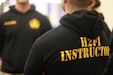 U.S. Army Reserve Holistic Health and Fitness (H2F) Instructor/Coach identifying sweatshirt at the H2F Summit on Joint Base McGuire-Dix-Lakehurst, Mar. 8, 2025. The U.S. Army Reserve and the 78th Training Division hosted the summit to provide program implementation and benefits to Army Reserve leaders. (U.S. Army Reserve photo by Staff Sgt. Tristan Peete)