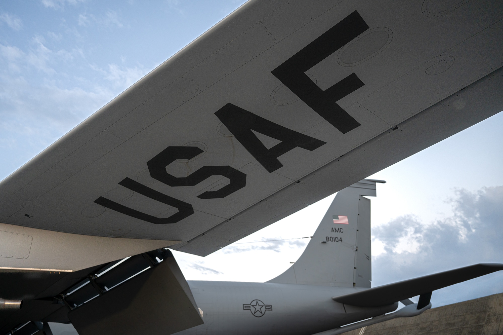 An aircraft sits on the flight line.