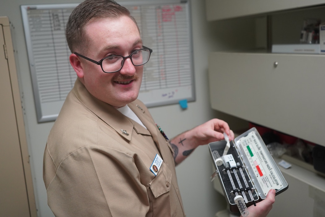 260104-N-FT324-8160. ROTA, Spain (January 4, 20226) — Hospital Corpsman 2nd Class Logan T. Pentz, a Preventive Medicine Technician assigned to Naval Medical Readiness and Training Command Rota, prepares sampling equipment while conducting routine public health monitoring. Pentz supports Navy Medicine’s mission by identifying potential health risks, ensuring environmental safety, and protecting the health and readiness of Sailors and operational forces. (U.S. Navy Released By Lt. Cmdr. Alicia Sacks)